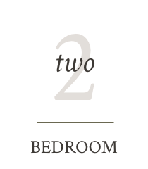 A picture of a bedroom with the number two on it.
