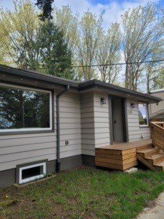 Before Exterior Painting with trees background — Seattle, WA — Cordeck Painting Services LLC