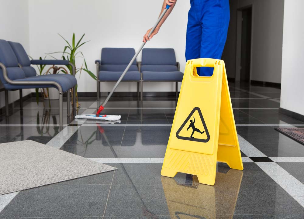 Wet Floor Caution Sign In Office — ACME Cleaning In Kariong, NSW