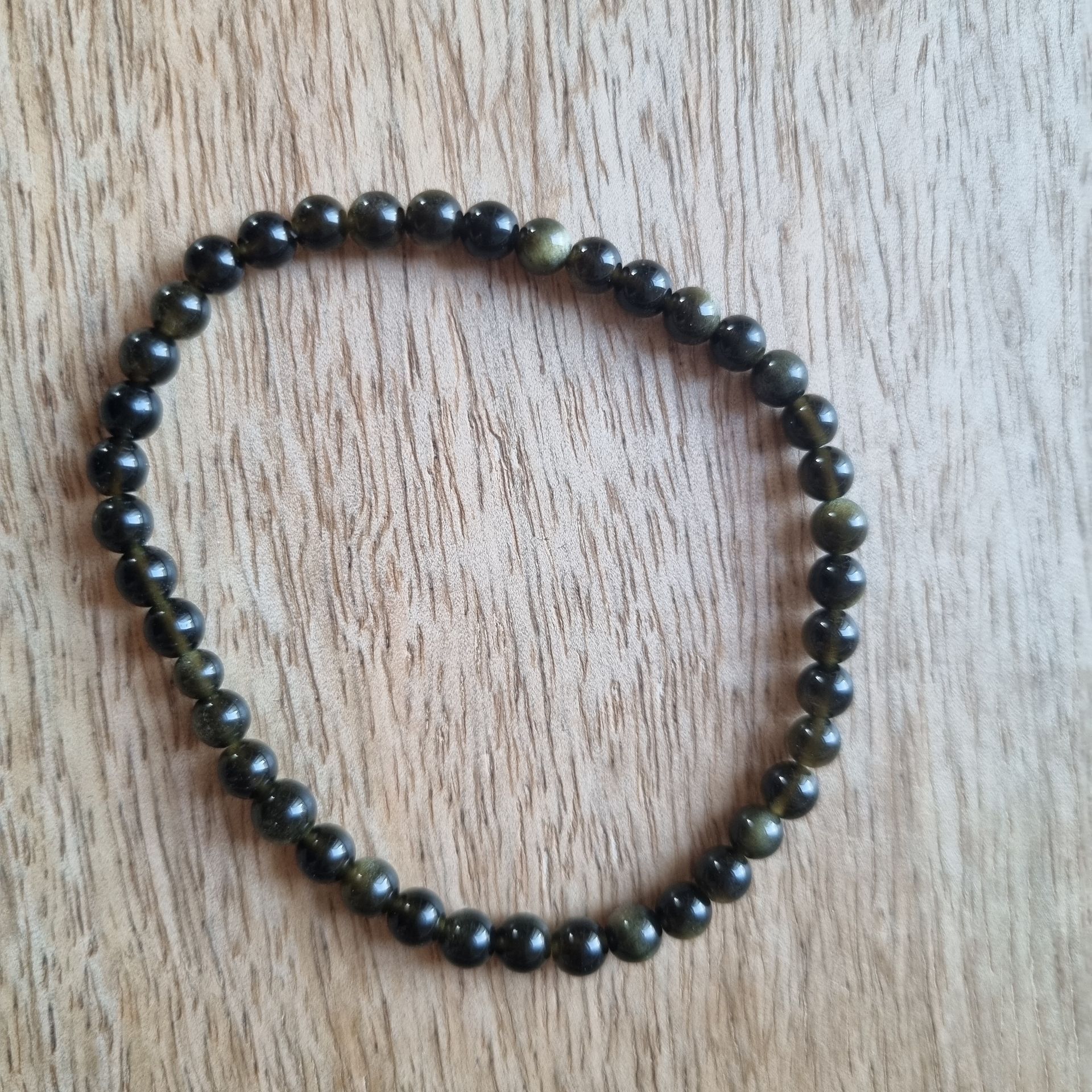 obsidiaan goud kralenarmband 4mm