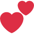 Two red hearts are sitting next to each other on a white background.
