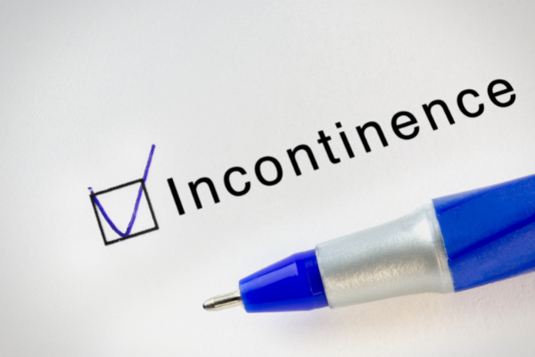 A blue pen is next to the word incontinence