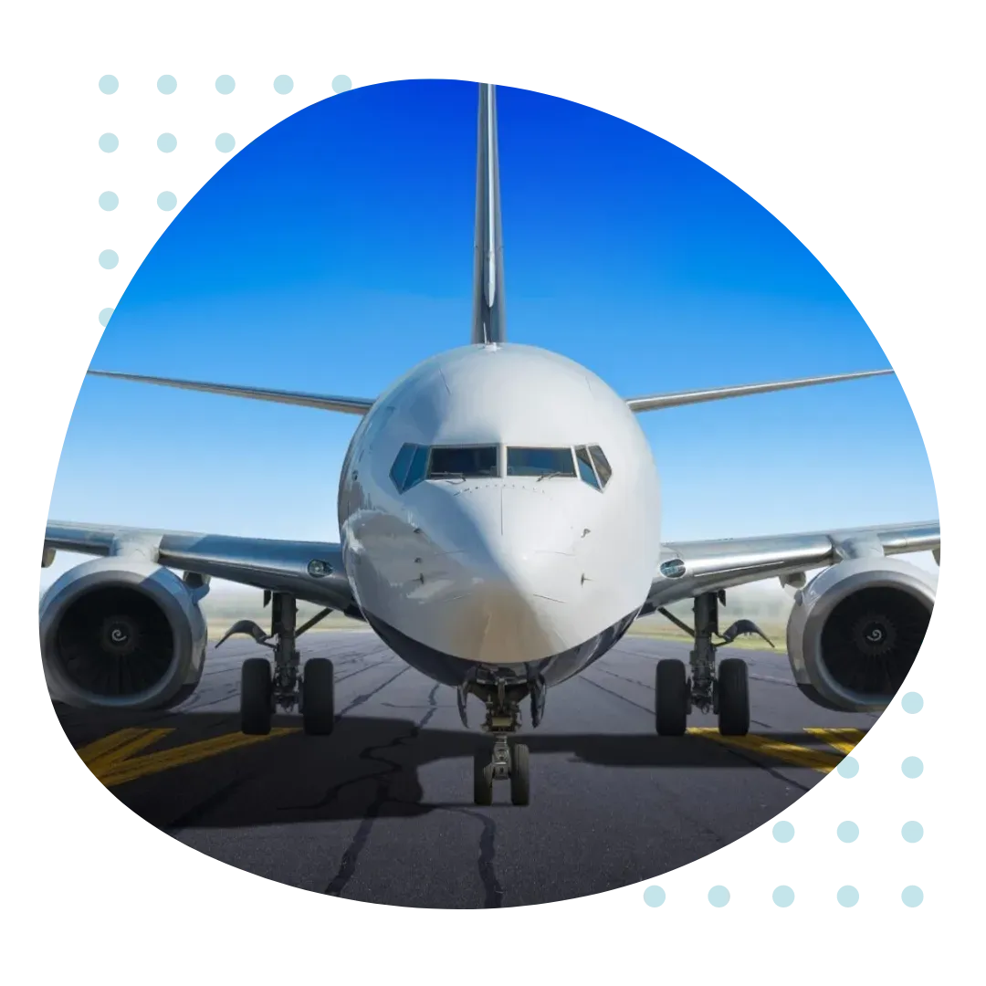 A large passenger jet is parked on a runway.