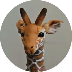 Giraffe peering at the camera, a playful nod to MaxFoo being one of the only bespoke 2D animation studios
