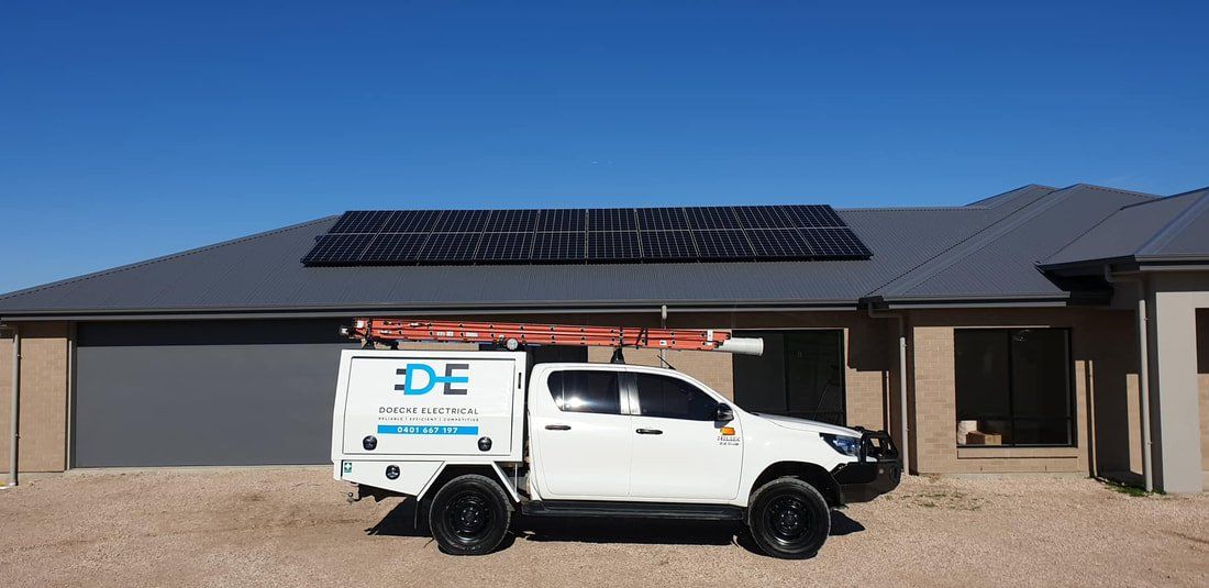 A photo of our local electrical & Solar installer Ute with sign writing for doecke electrical.