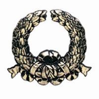 Silver laurel wreath with ribbon.