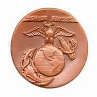 Bronze Marine Corps emblem: eagle atop globe with anchor, banner 