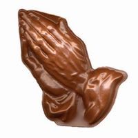 Brown hands clasped in prayer.