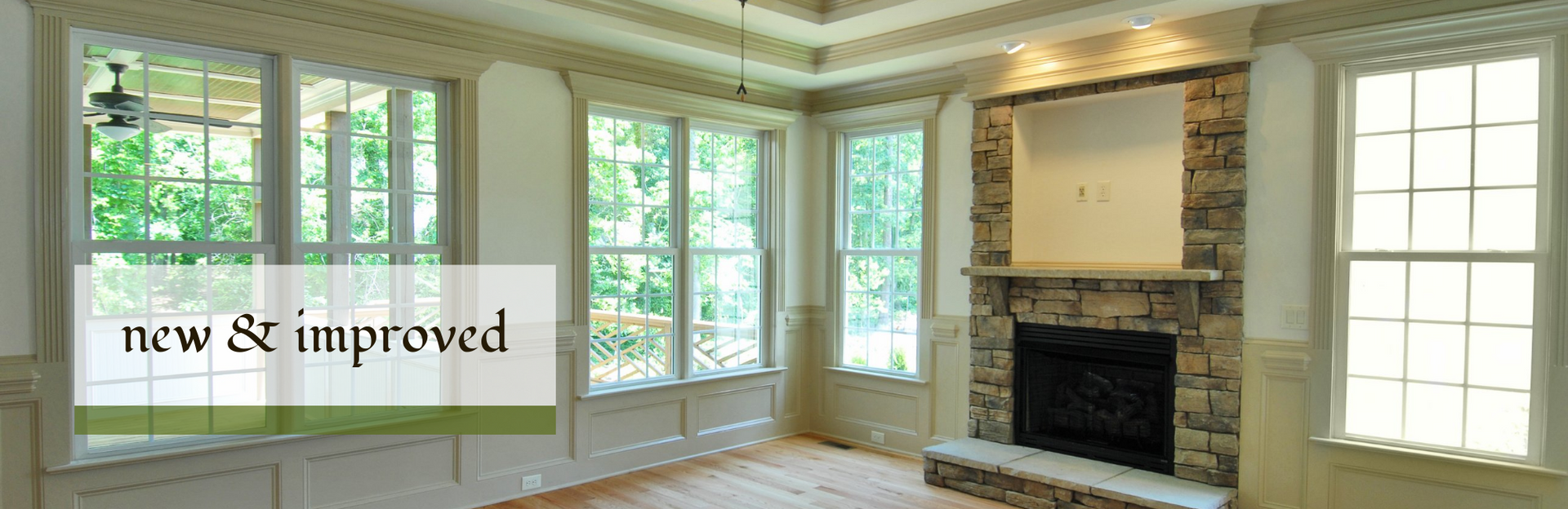 A living room with windows, a stone fireplace, and a text overlay reading 