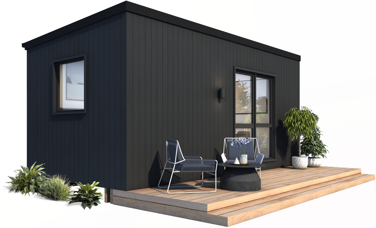 Modern black tiny house with wood deck, outdoor seating, and potted plants.
