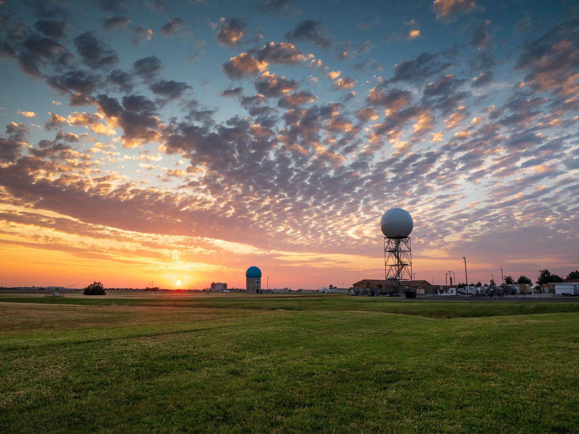 Sunset over Edmond, Oklahoma with weather radar tower