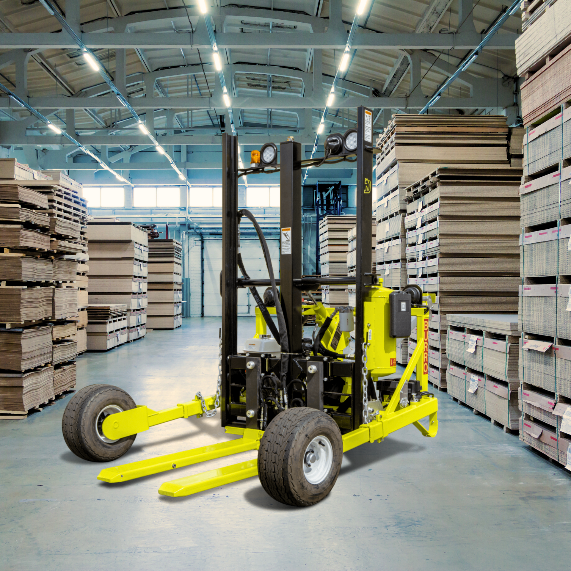 Yellow forklift in a warehouse loading plywood stacks.