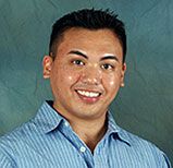 Dr. Duc Hong Phan wearing blue button-down shirt