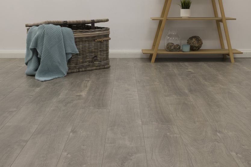 Rattan Basket on Laminate Flooring — Flooring Suppliers in Port Macquarie, NSW