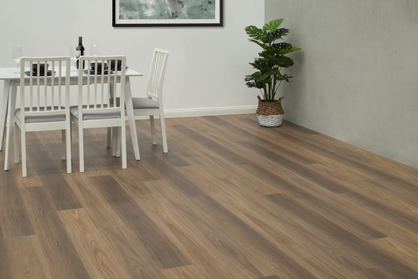 White Dining Table on Timber Flooring — Flooring Suppliers in Port Macquarie, NSW