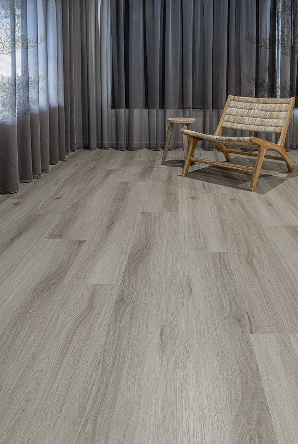 A Living Room With Curtains, Table, And a Chair — Flooring Suppliers in Port Macquarie, NSW