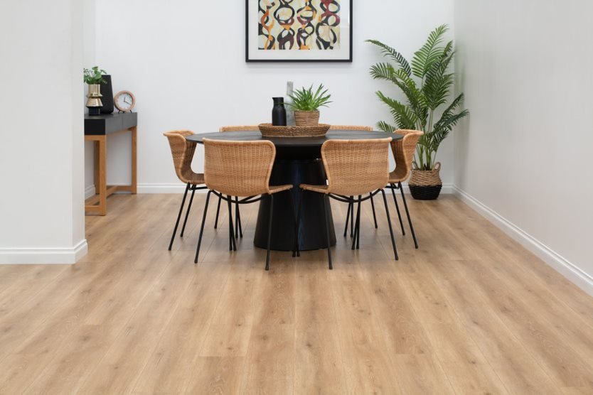 Table with Rattan Chairs on Hybrid Flooring — Flooring Suppliers in Port Macquarie, NSW