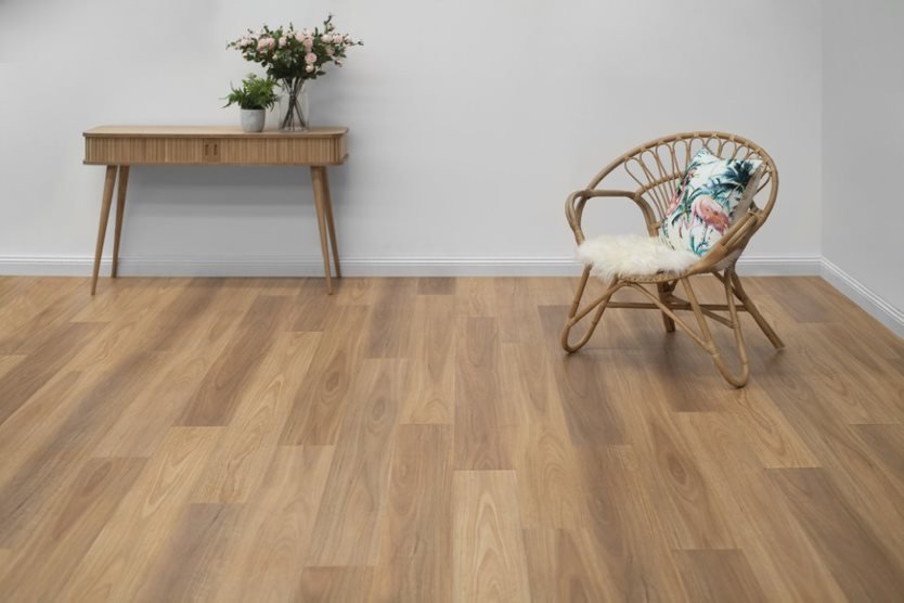 Rattan Chair on Vinyl Plank Flooring — Flooring Suppliers in Port Macquarie, NSW