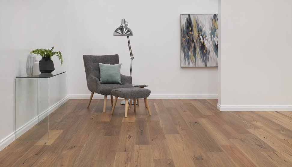 Grey Chair on Vinyl Plank Flooring — Flooring Suppliers in Wauchope, NSW