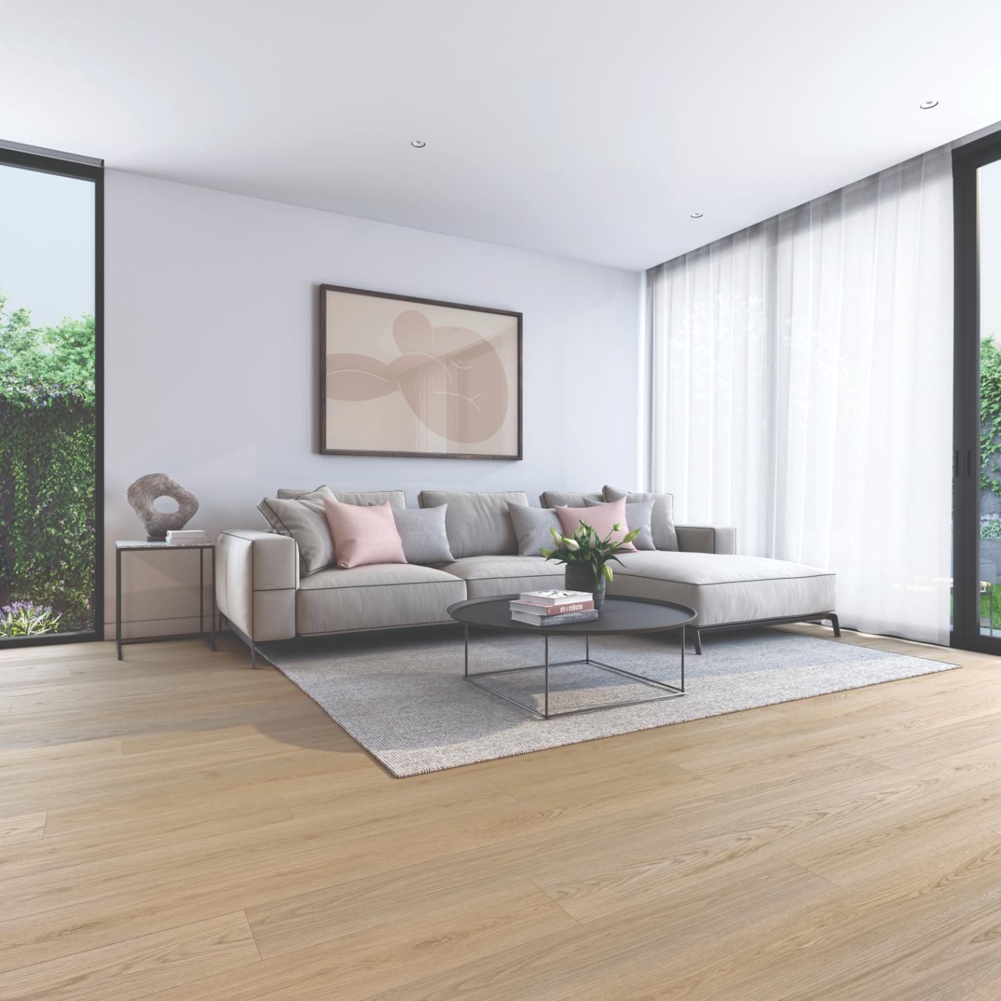 A Living Room with a Sofa, Painting on Wall and a Table on a Carpet on a
Floor — Flooring Suppliers in Port Macquarie, NSW