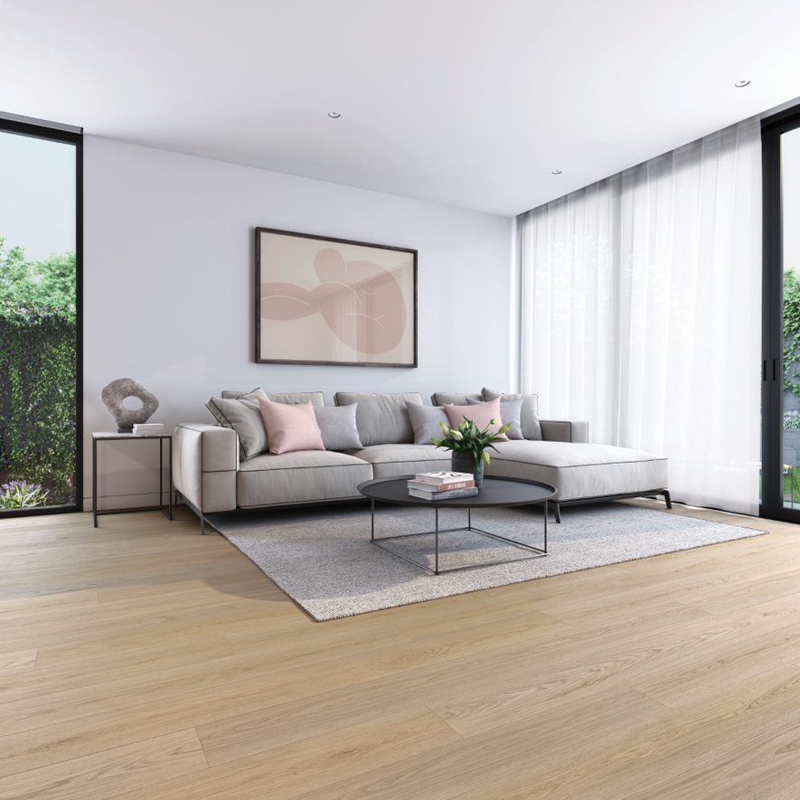 A Living Room with a Sofa, Painting on Wall and a Table on a Carpet on a
Floor — Flooring Suppliers in Port Macquarie, NSW