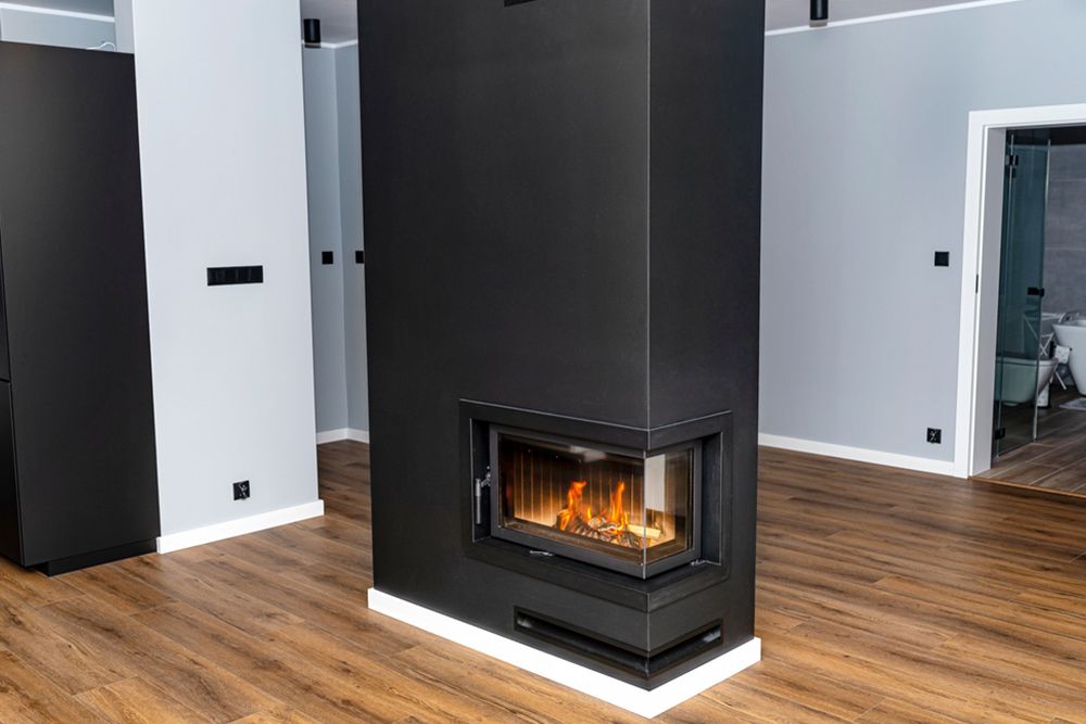 Beautiful living room with fireplace — Floor Coverings in Kempsey, NSW