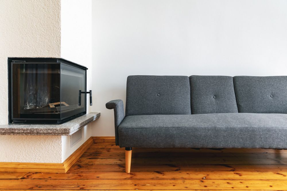 Couch and firewood — Floor Coverings in Kempsey, NSW
