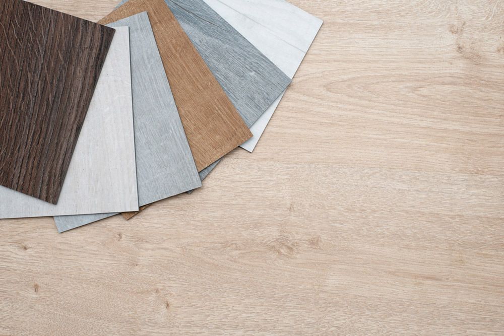 Different types of vinyl in white flooring — Floor Coverings in Harrington, NSW