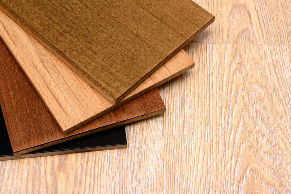 Pile of wooden flooring board — Floor Coverings in Kempsey, NSW