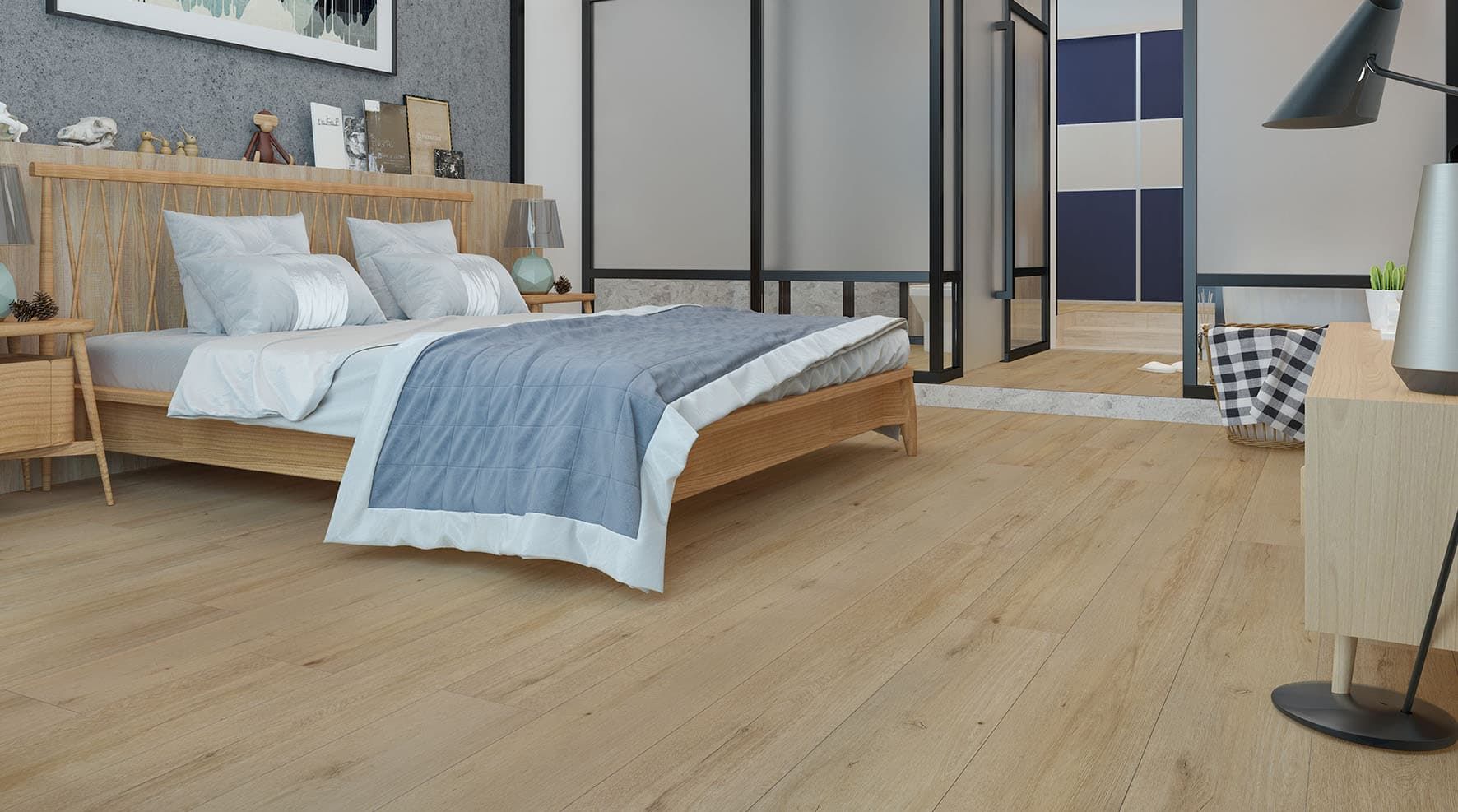 A Bedroom With Hardwood Floors And A Large Bed — Floor Coverings in Taree, NSW