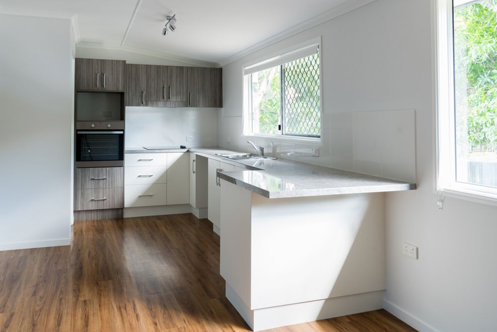 Timber flooring in modern kitchen — Flooring Store Near Kempsey, NSW