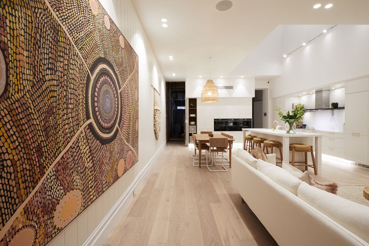 A Living Room With A Large Painting On The Wall — Flooring Suppliers in Port Macquarie, NSW