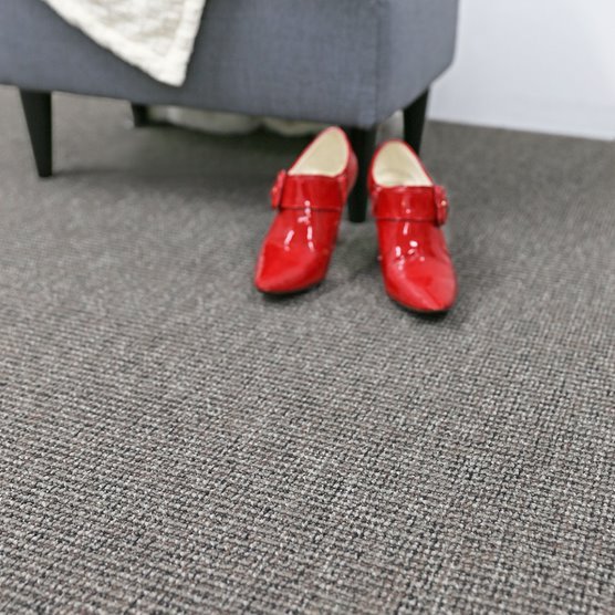 Red Shoes on Grey Carpet — Flooring Suppliers in Port Macquarie, NSW