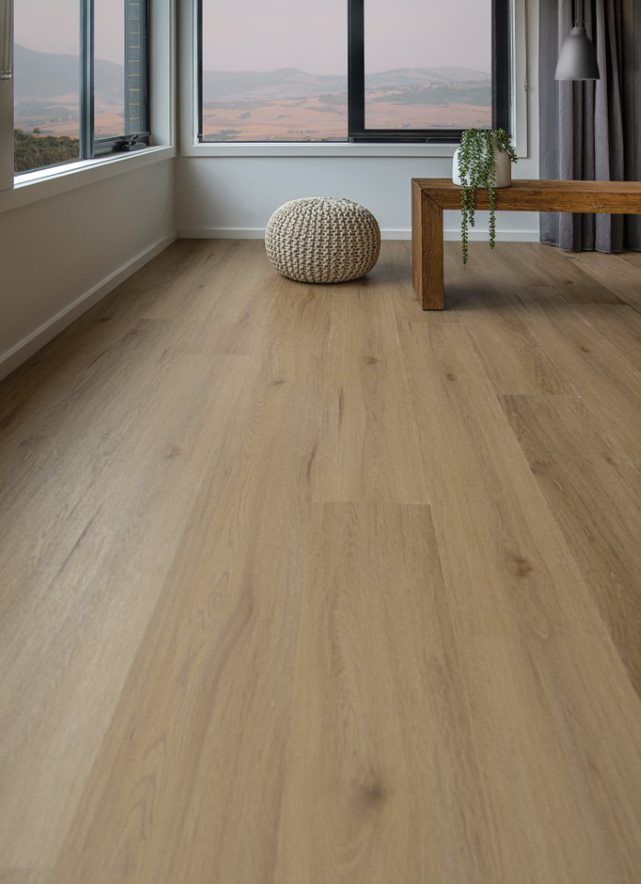 A Couple Of Chairs Are Sitting At A Desk In A Room — Flooring Suppliers in Port Macquarie, NSW