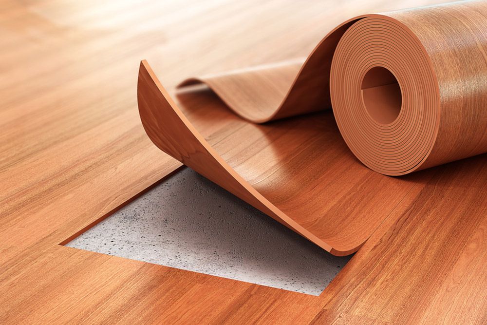 Laminated orange flooring for home — Flooring Store Near Taree, NSW