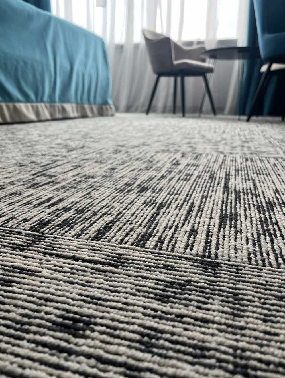 Black Chair and Side Table — Flooring Suppliers in Port Macquarie, NSW