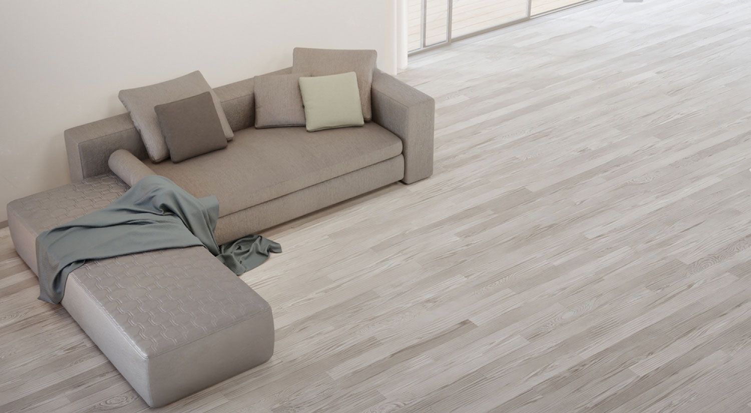 Large Grey Couch on Timber Flooring — Flooring Suppliers in Wauchope, NSW