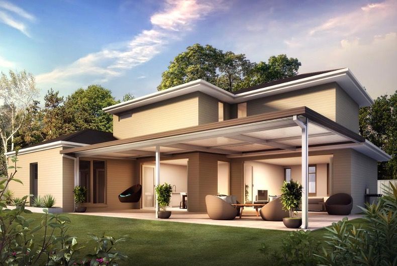 Modern two-story house with a covered patio, grassy yard, and trees under a blue sky — Narellan Home Improvement Centre In Narellan, NSW