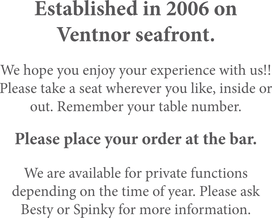A sign that says established in 2006 on ventnor seafront