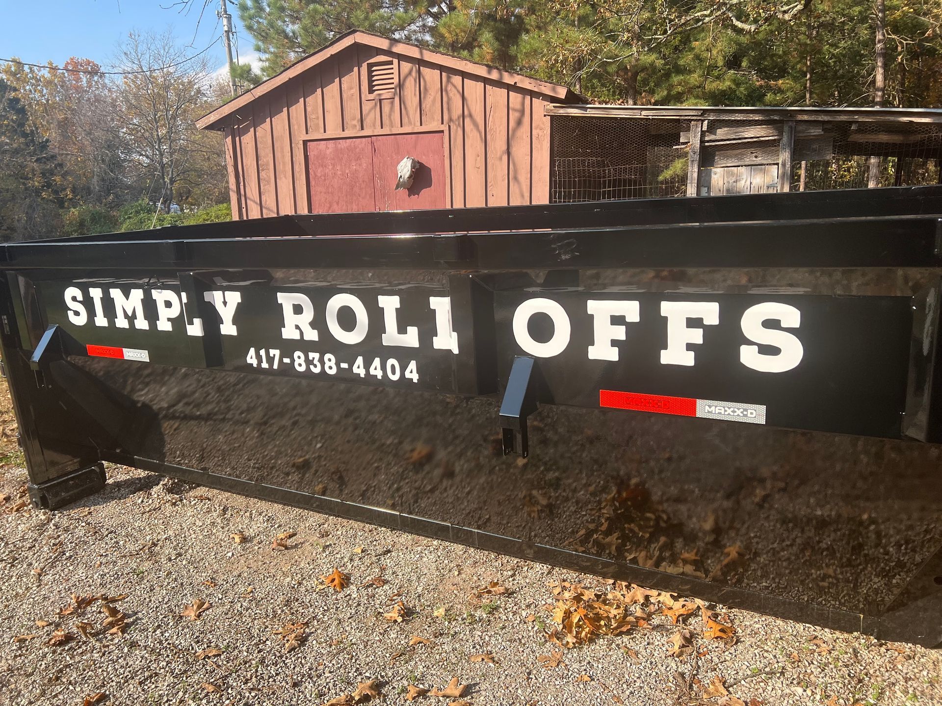 Black dumpster with 