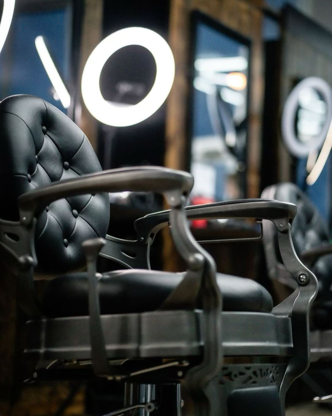 A close up of a barber chair in a barber shop