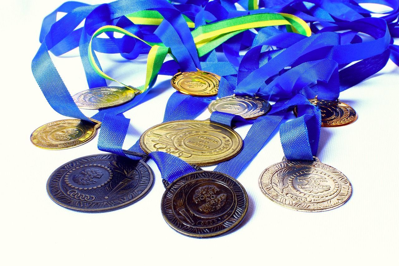 photo of a pile of ribbons and medals