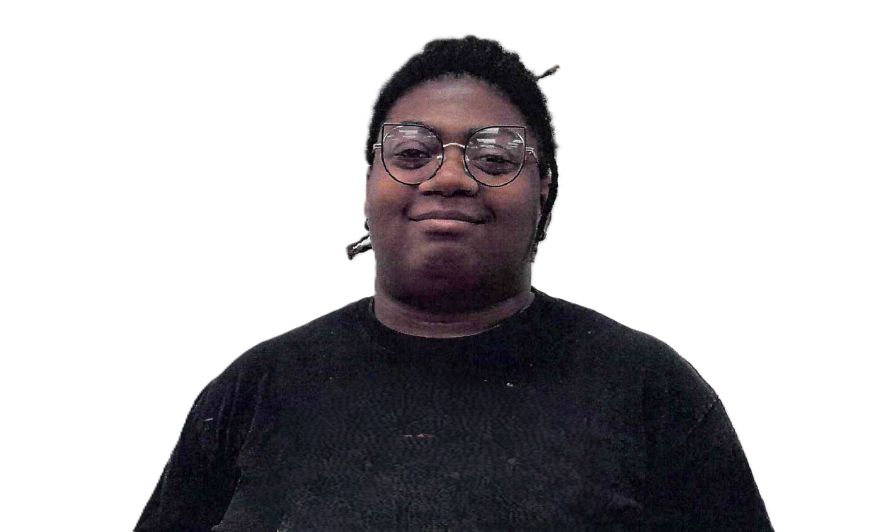 Person wearing glasses and a black shirt smiles in front of a white background.