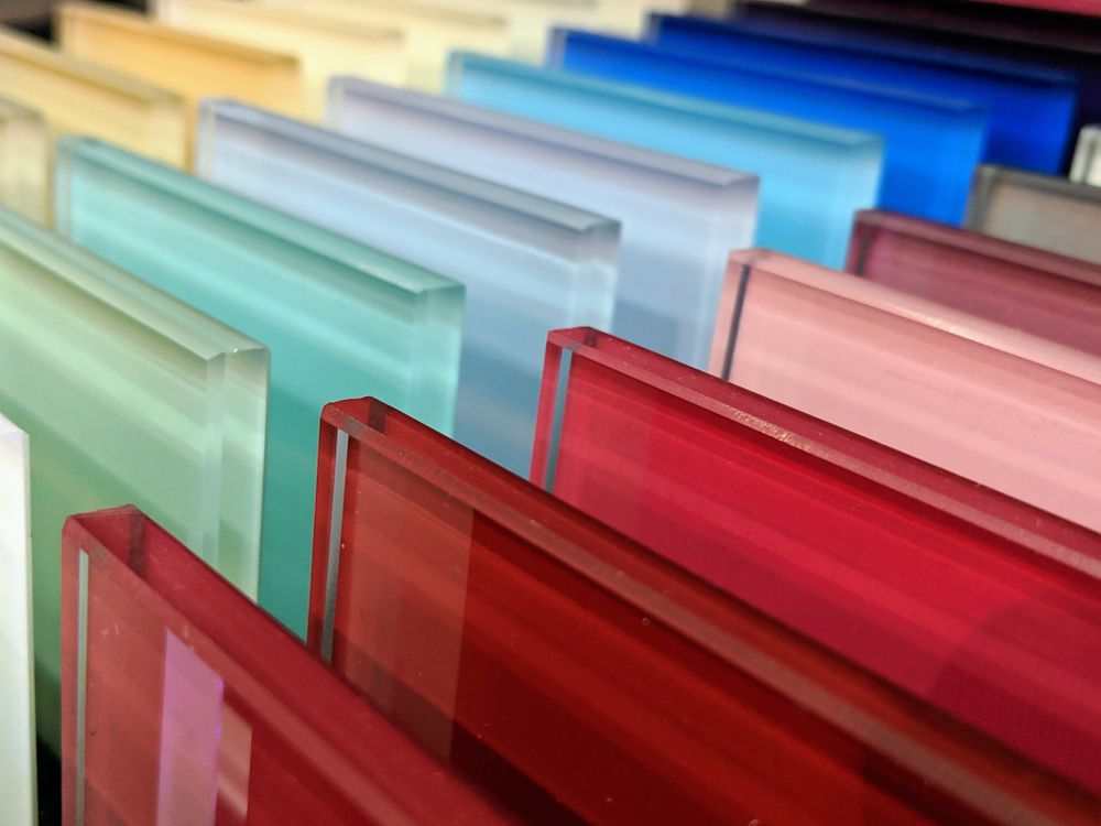 A Colored Glass Samples in Various Hues Arranged in A Row — Downs Window Renewals in Harristown, QLD