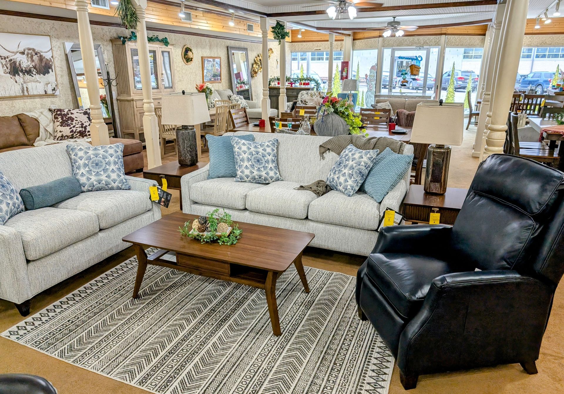 A living room filled with furniture and a coffee table.