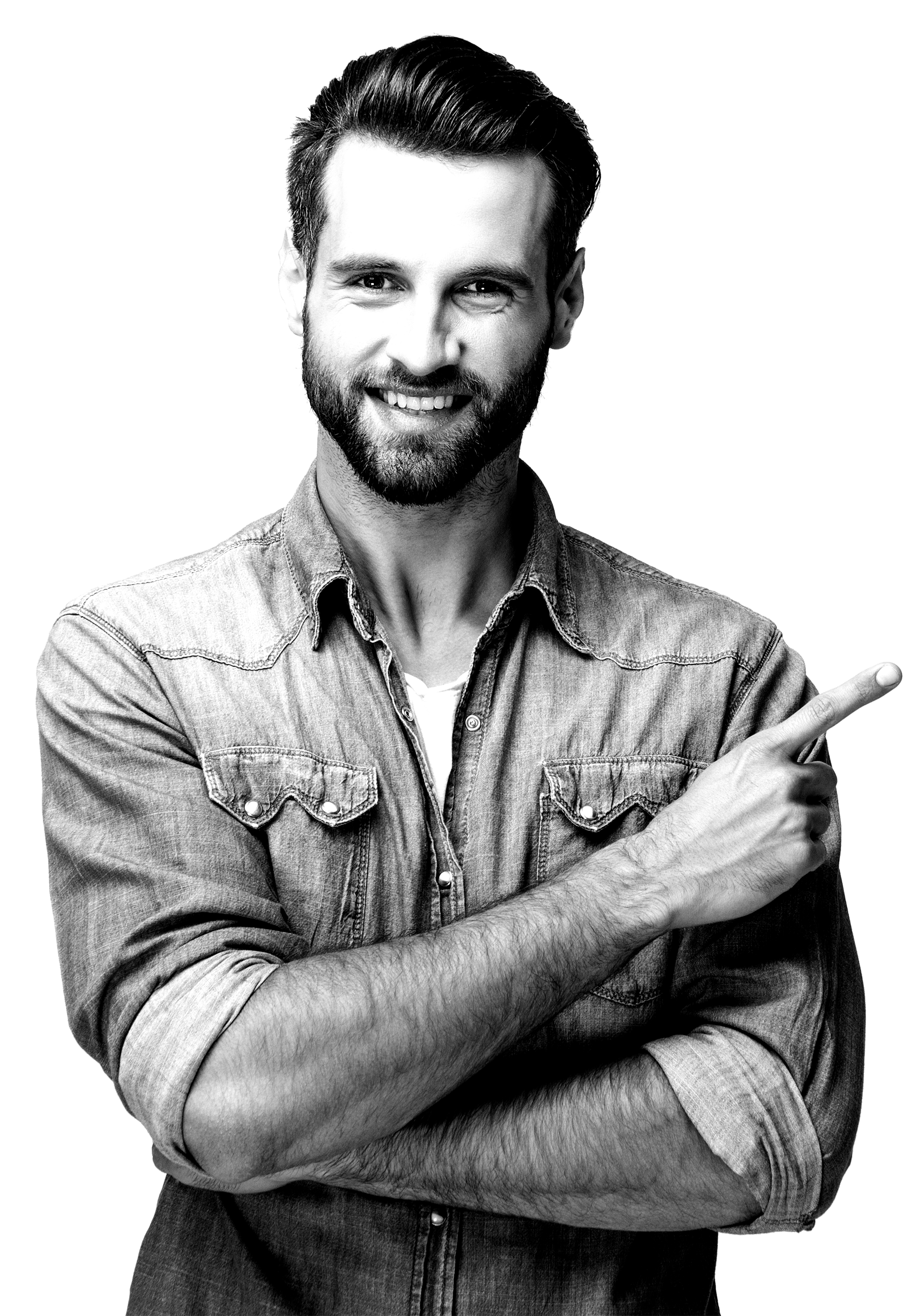 Man with beard smiles and points right, wearing denim shirt.