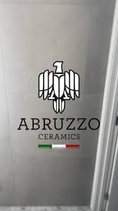 Logo: Abruzzo Ceramics, stylized eagle, Italian flag colors.
