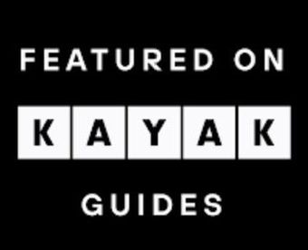 Black logo reading “Featured on KAYAK Guides” in white text on a black background