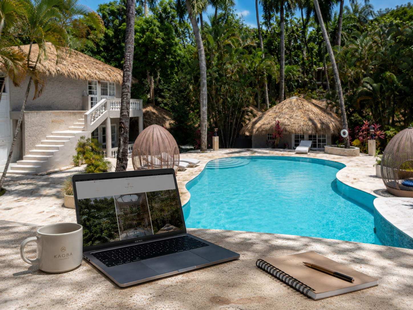 Laptop near the pool at Hotel Kaoba in Cabarete