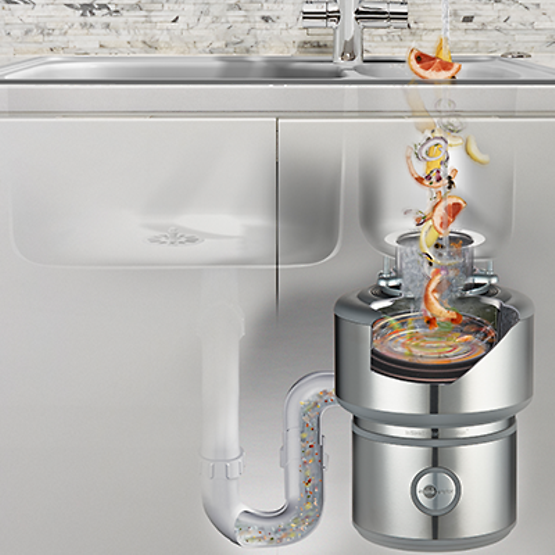 a stainless steel garbage disposal is under a sink in a kitchen .